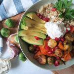 Roasted veggie bowl with garlic sauce