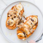Sweet Potato Boats on white plate with fork