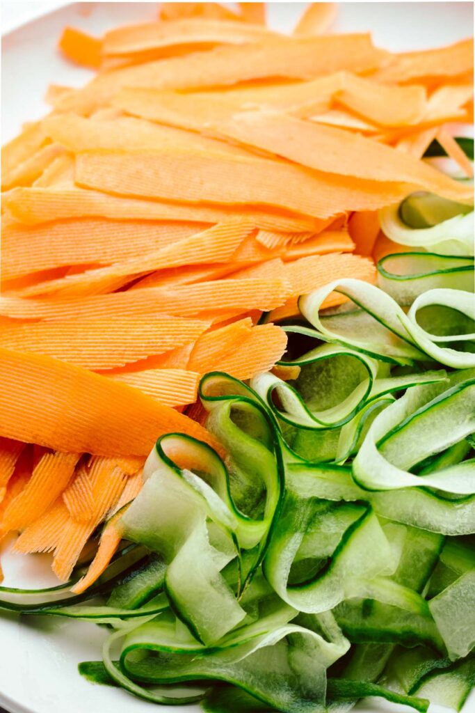 Closeup of cucumber and carrot ribbons