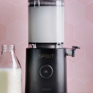 Nama M1 milk maker showing ‘SPOUT’ on display, ready to pour milk.